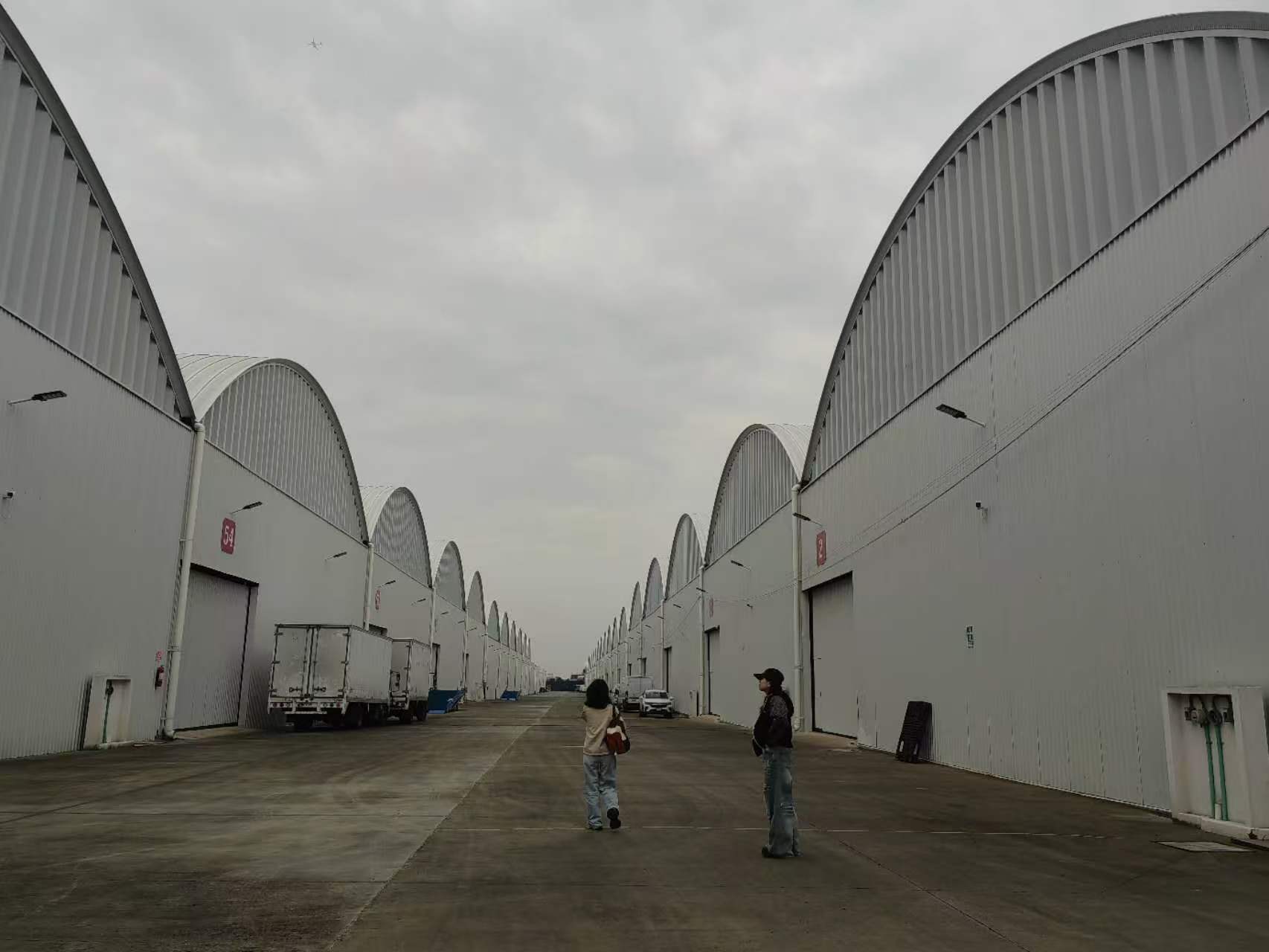 Exterior aisle between warehouse buildings in Mexico