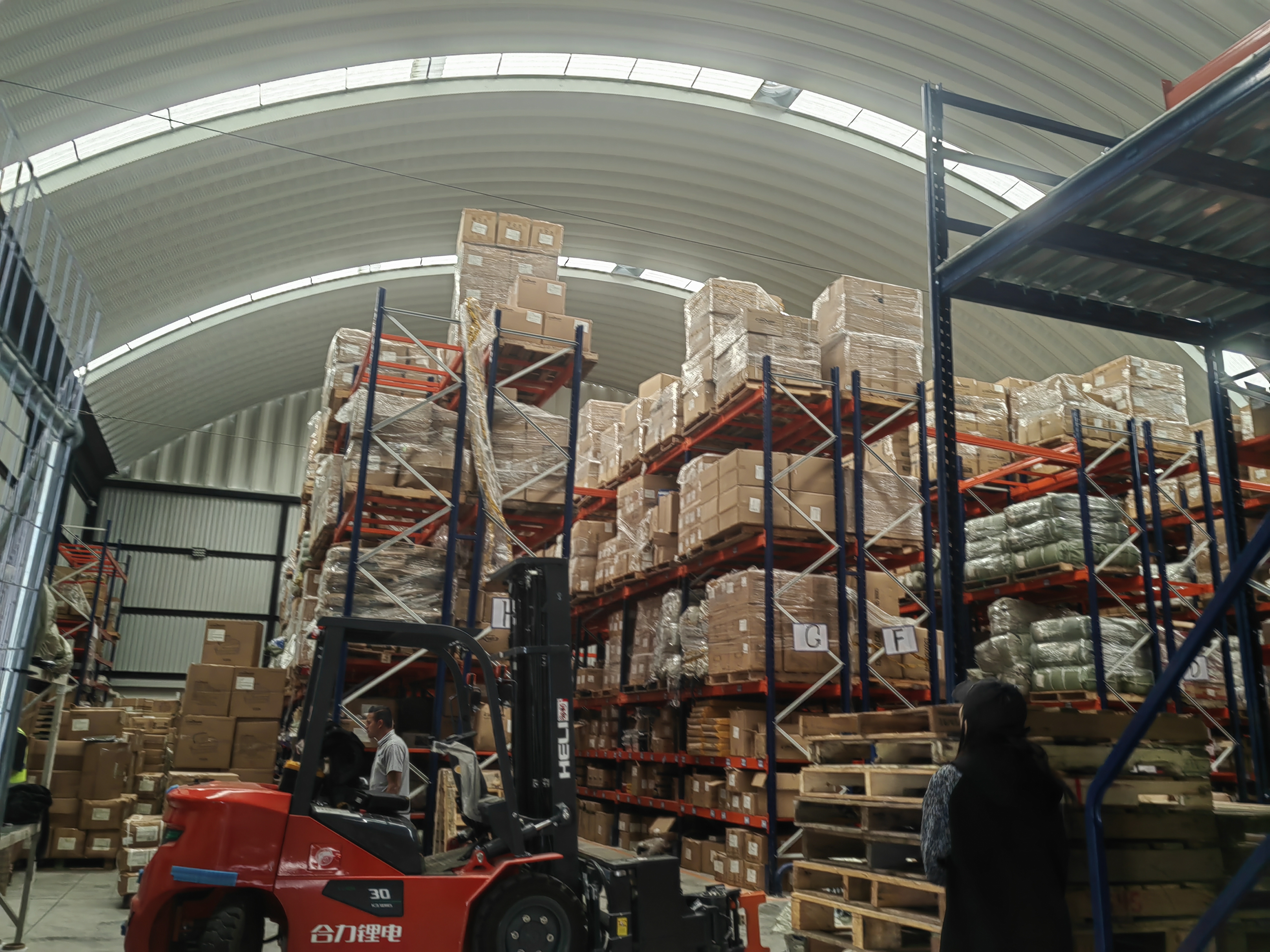 Warehouse operations with racking and forklift equipment in Mexico