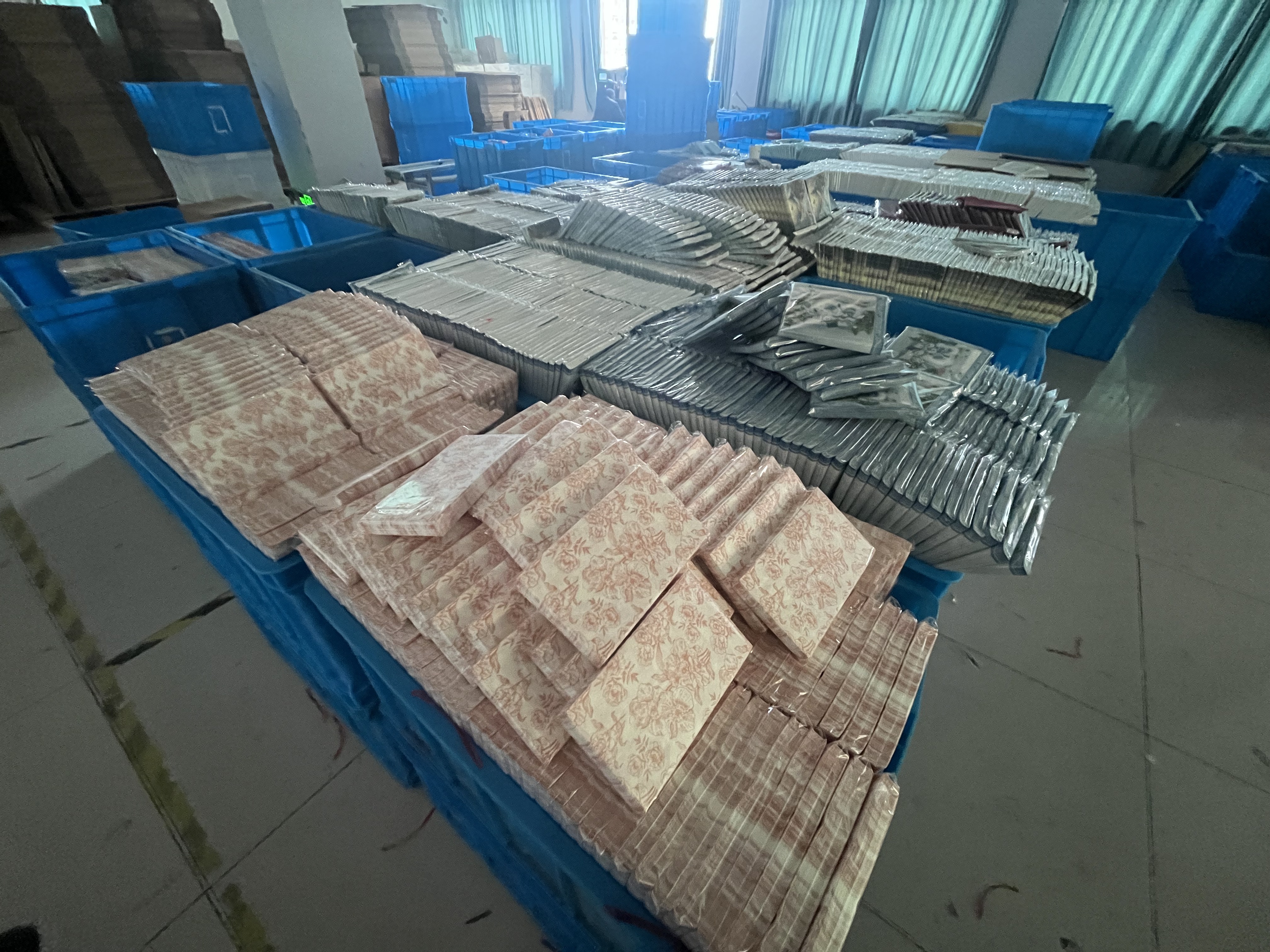 Paper goods and semi-finished products staged for factory processing
